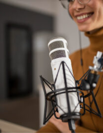 woman-broadcasting-radio-while-smiling-1